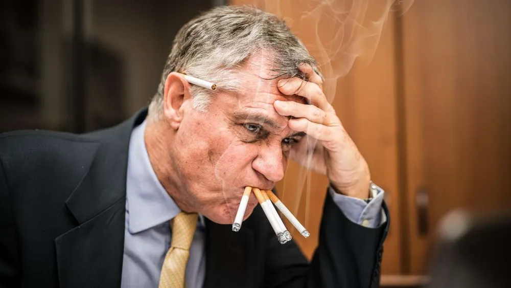 Man_Smoking_Multiple_Cigarettes_1344x756.webp